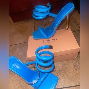 stargaze blue faux snake spiral stiletto heels
size: US 8 UK 6 EU 39
Never worn